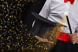 Magician,Hands,With,Magic,Wand,Conjuring,Sparkling,Stars,Stream,