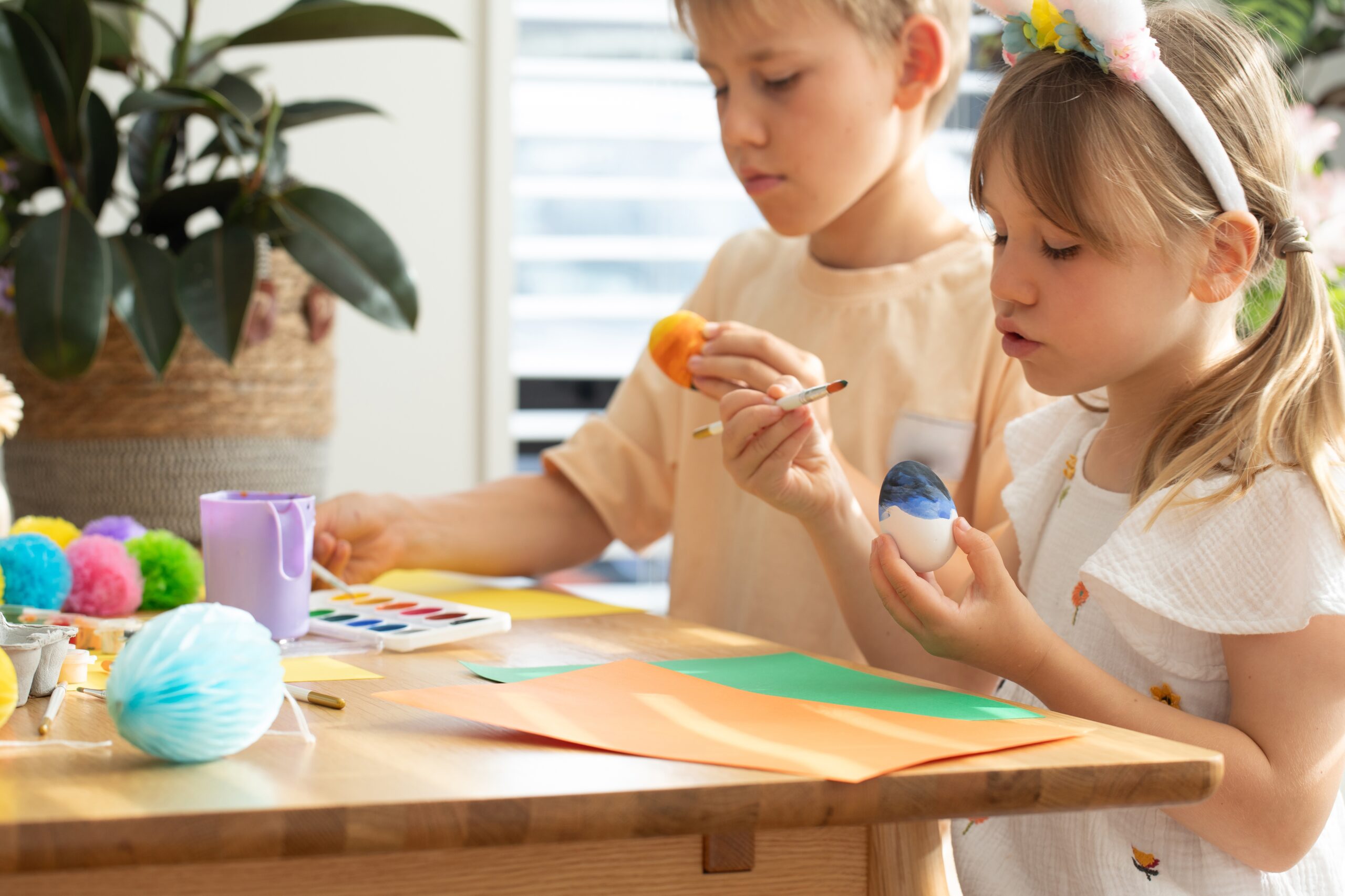 Children,Enjoy,Doing,Easter,Crafts,By,Painting,Eggs,Indoors.,Brother